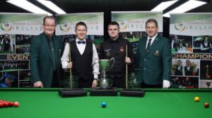 O'Donoghue and Bulman pose with the trophy and officials.