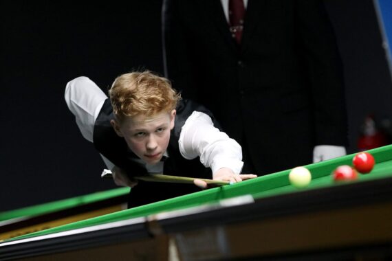 Artemijs Žižins plays a shot.