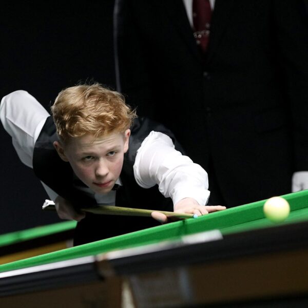 Artemijs Žižins plays a shot.