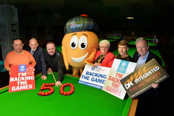 Photo of John Higgins and group