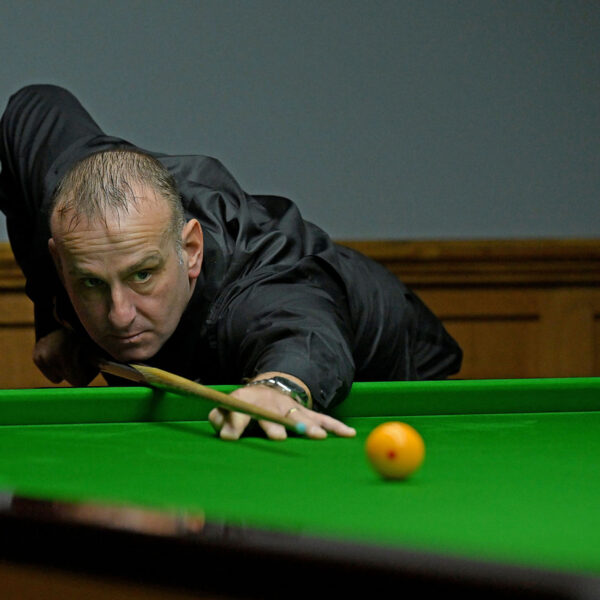 David Causier plays a shot.