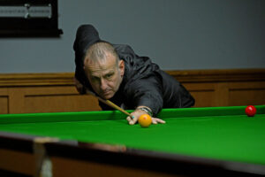 David Causier plays a shot.