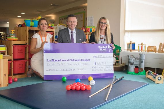 Jason Ferguson presenting cheque