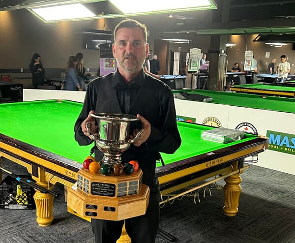 Jason Williams poses with the Canadian Snooker Championship trophy.