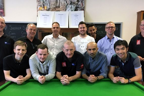 Photo of Steve Davis with coaches