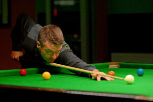 Michael Holt plays a shot.