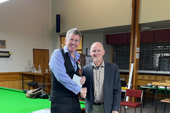 Peter Gilchrist poses for photo as he is awarded with the winner's prize.