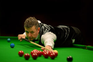 Peter Lines plays a shot.