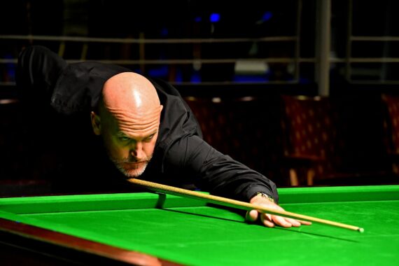 Peter Sheehan plays a shot.