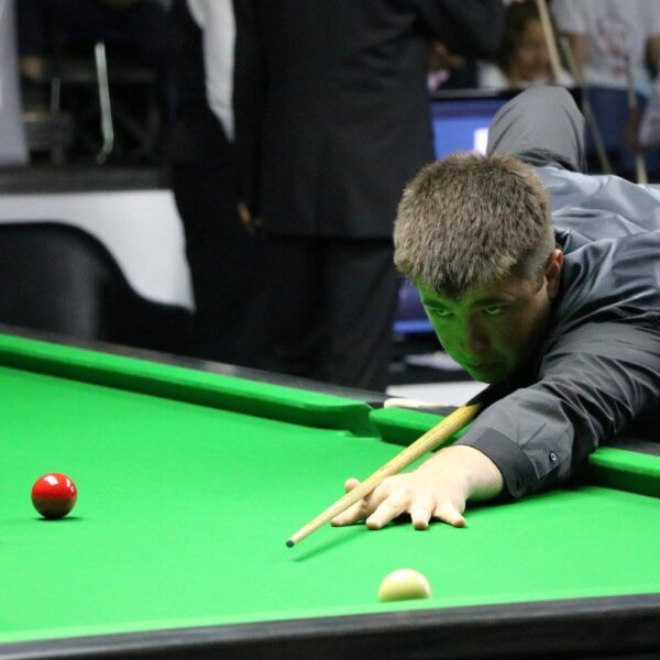 Shaun Dalitz plays a shot.