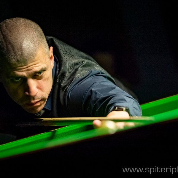 Steve Mifsud plays a shot.