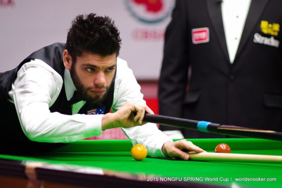 Vinnie Calabrese plays a shot with the rest in his waistcoat at the 2015 World Cup whilst representing Australia.