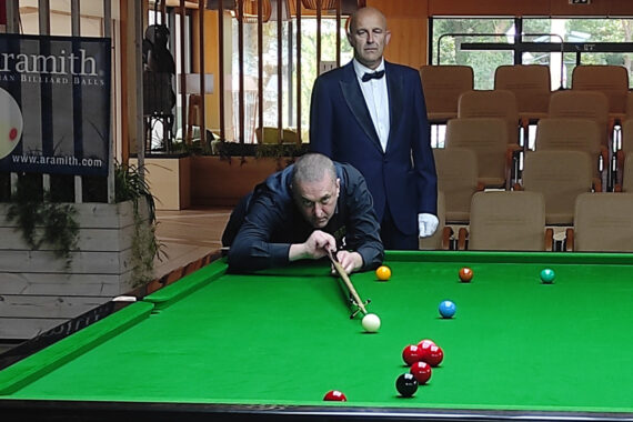 Wayne Brown plays a shot.