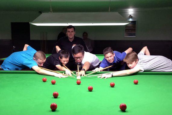 Photo of John Woods and juniors