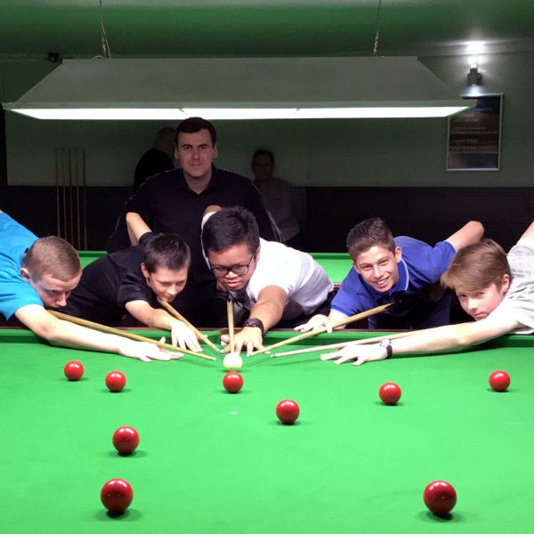 Photo of John Woods and juniors